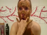 Nasty bitch got her face and body covered in poop